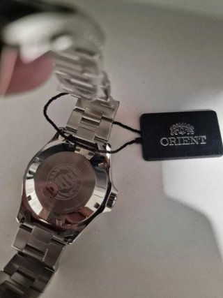 Reloj Orient Naranja y Plateado