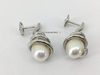 pendientes oro 18k con diamante
