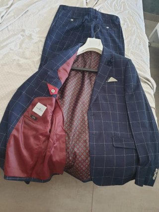 Traje de chaqueta a cuadros azul