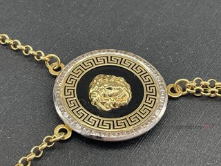 manita oro 18k con piedra