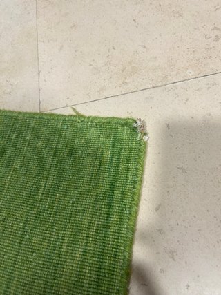 Alfombra de lana verde