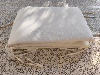 Cojín protector cuna beige