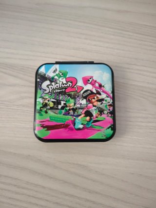 2 giochi Nintendo switch+ porta schede giochi