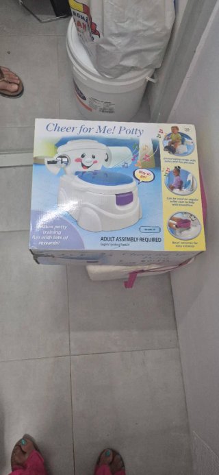 Orinal infantil con cara sonriente