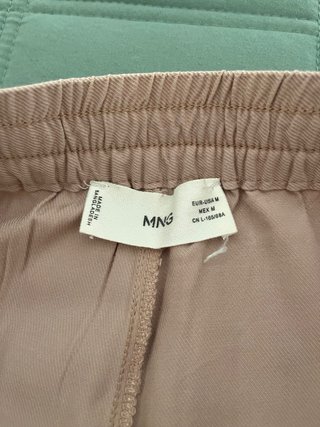 Pantalón largo fluido de Mango rosa palo mujer