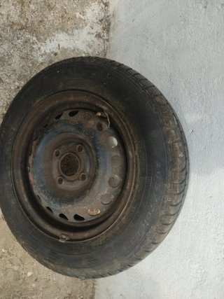 Llanta usada con su rin  165/70 R13