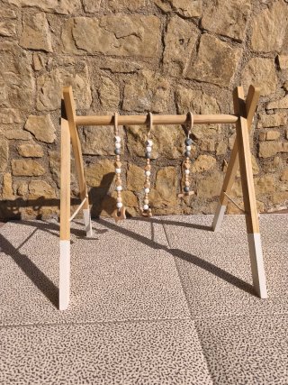 Gimnasio de madera para bebé