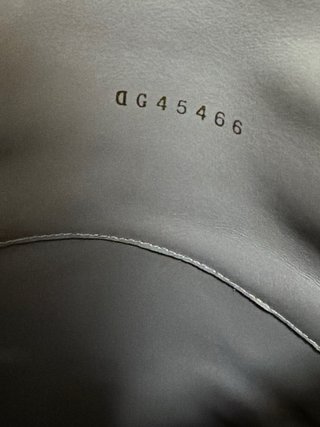 Botas altas Chanel grises con cadena