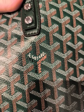 Bolso mano verde y marrón