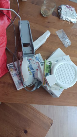 Consola Wii con accesorios y juegos