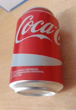 Lata Coca-Cola sin abrir