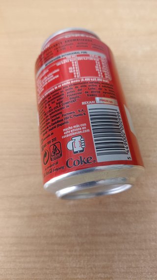 Lata Coca-Cola sin abrir