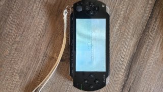 Console PSP Sony + 2 Giochi