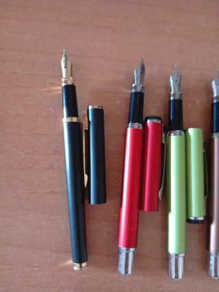 4 penne stilografiche colorate