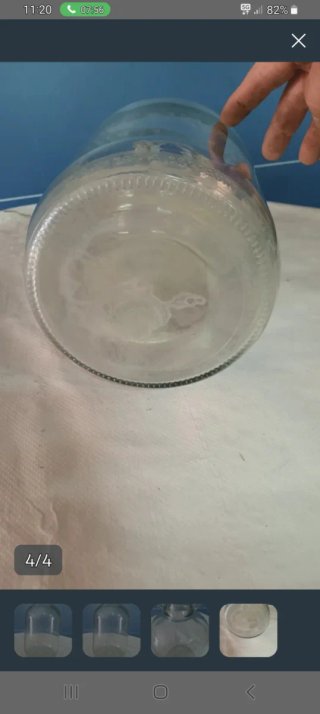 Botella de vidrio con asas
