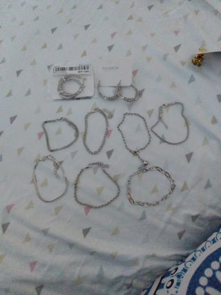 Pulsera plateada con brillantes de acero 5 euros