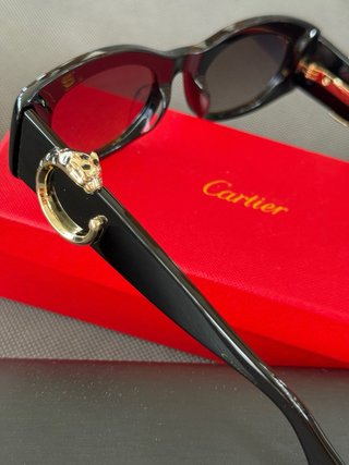 Occhiali da sole Cartier donna neri e dorati
