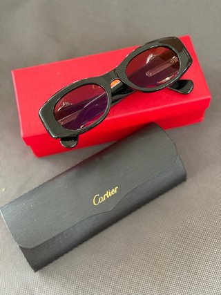 Occhiali da sole Cartier donna neri e dorati