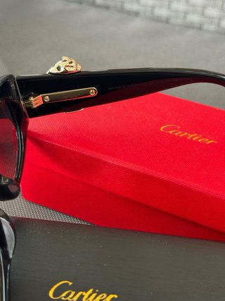 Occhiali da sole Cartier donna neri e dorati