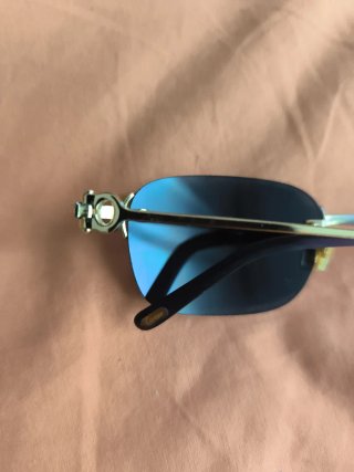 Gafas de sol Cartier moradas y doradas