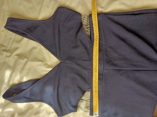 Mono negro talla L con detalles