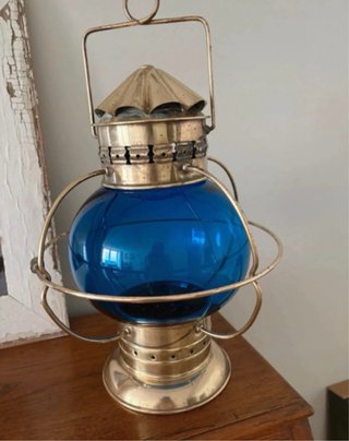 Farol náutico antiguo azul y dorado