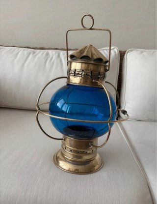 Farol náutico antiguo azul y dorado