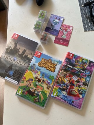 Nintendo Switch OLED + 3 Giochi + Amiibo