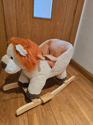 Mecedora infantil león peluche