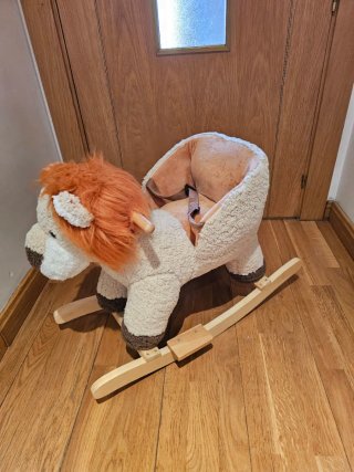 Mecedora infantil león peluche