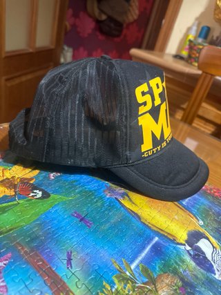 Gorra SPACE MAN negra y amarilla