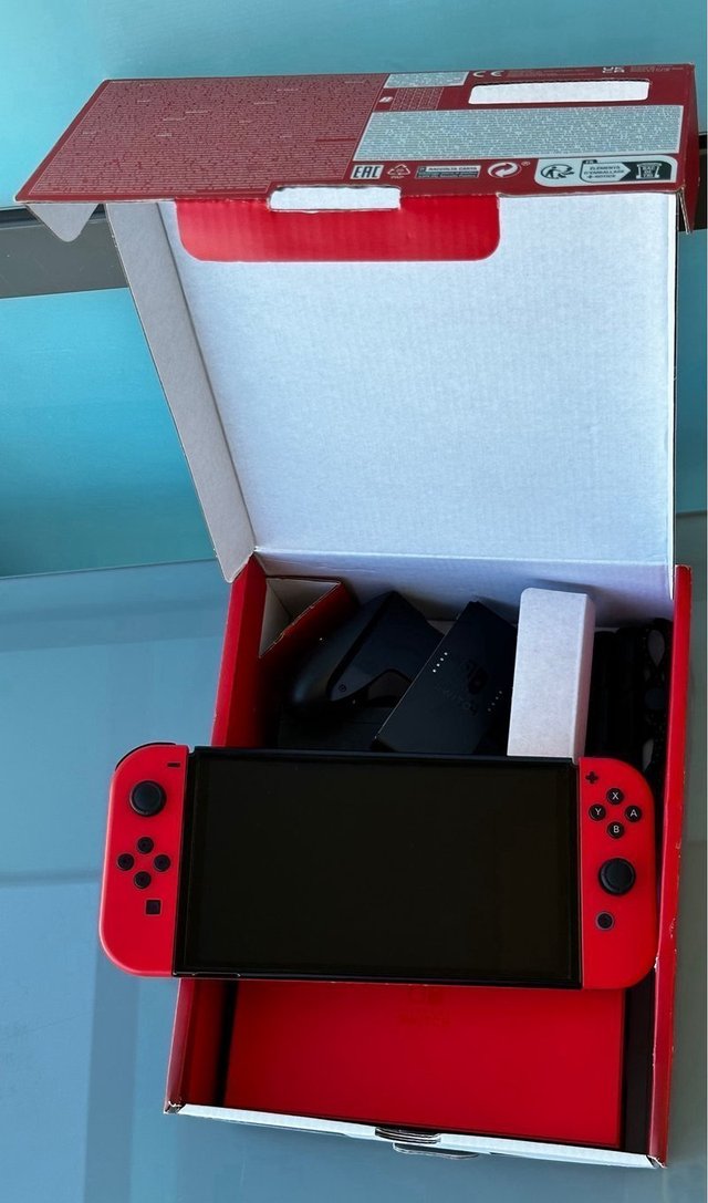 Nintendo OLED Completa + 16 Giochi