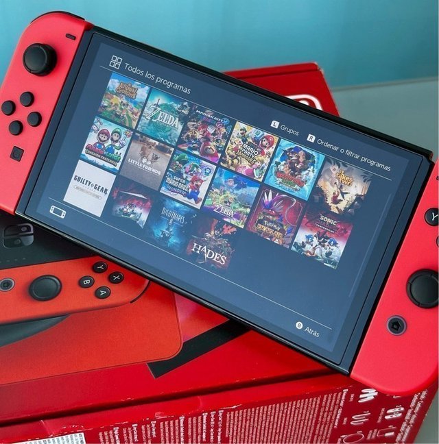 Nintendo OLED Completa + 16 Giochi