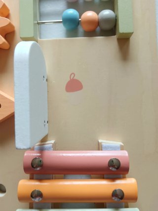 Tabla de juegos para bebé de madera