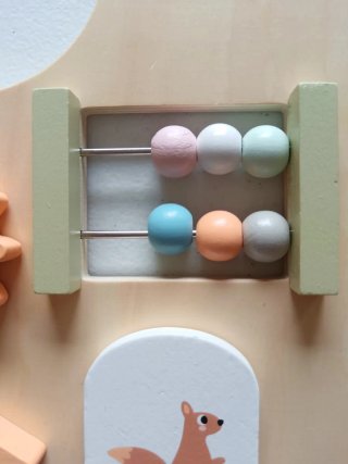 Tabla de juegos para bebé de madera