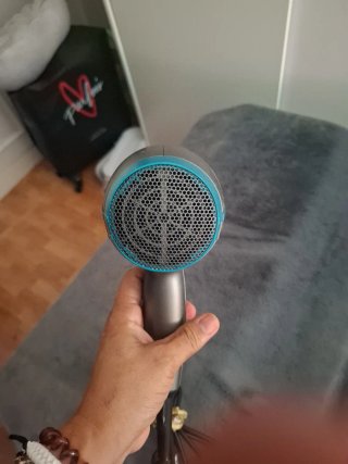 Secador de pelo gris y turquesa