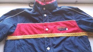 Chaqueta cortavientos niño azul y rojo