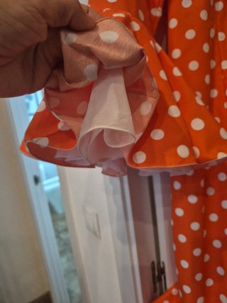 Traje de flamenca naranja lunares blancos