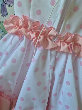 Traje de flamenca rosa y blanco