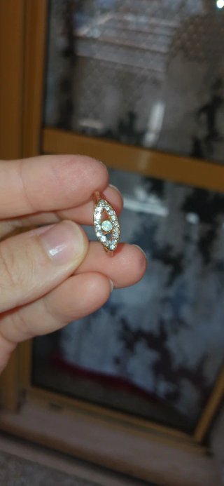 Anello oro 18k con opale e diamanti malocchio