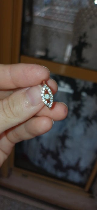 Anello oro 18k con opale e diamanti malocchio