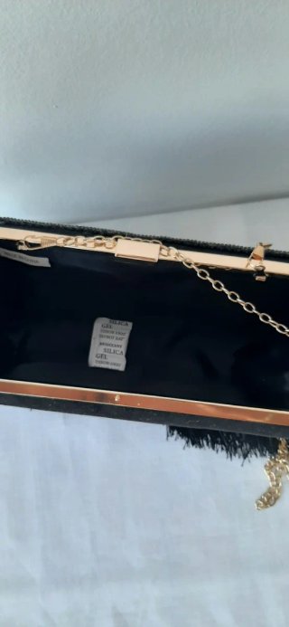Bolso de fiesta negro con flecos y detalles