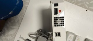 Nintendo Wii + 3 mandos + 2 nunchuks + 2 juegos