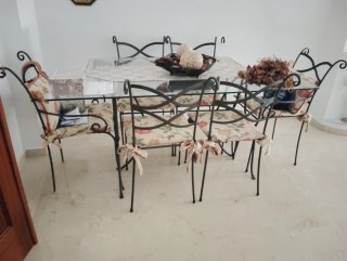Mesa cristal y 6 sillas forja