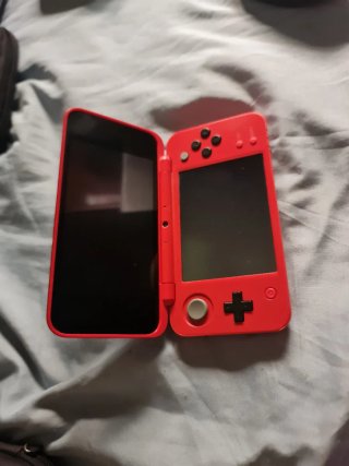 Nintendo New 2DS XL Pokeball + juegos