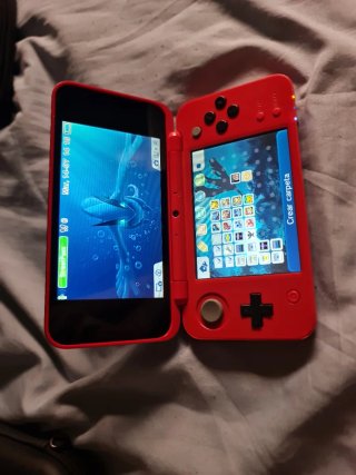 Nintendo New 2DS XL Pokeball + juegos
