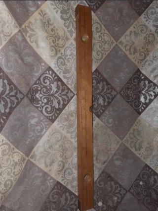Nivel de madera con burbuja