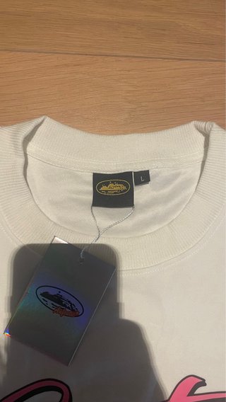 Sudadera Corteiz Blanca Logo Rosa