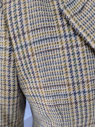 Chaqueta de cuadros beige y marrón