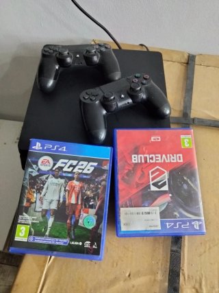 PS4 (PlayStation 4) con 2 mandos y juegos